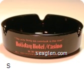 ''The only thing we overlook is the river'', Holiday Hotel / Casino, On the Truckee River, Mill and Center Streets Downtown Reno - Orange imprint Glass Ashtray